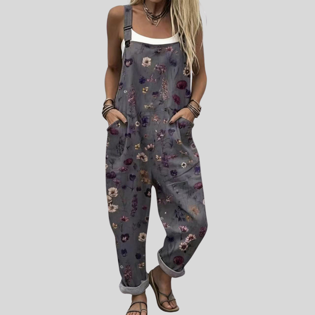 Graue Latzhose mit bunten Blümchen