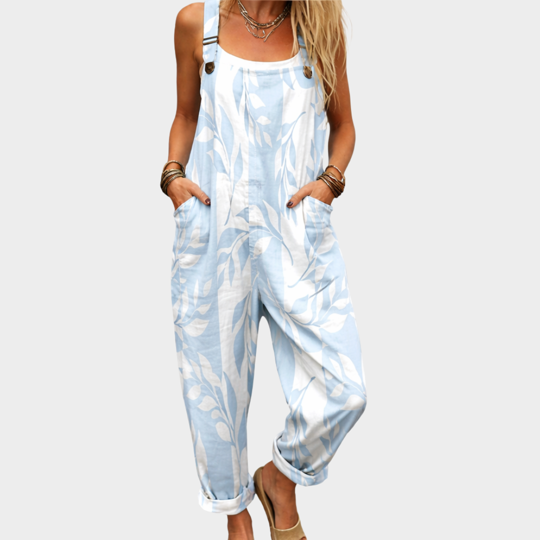 Latzhose mit hellblauem Blättermotiv
